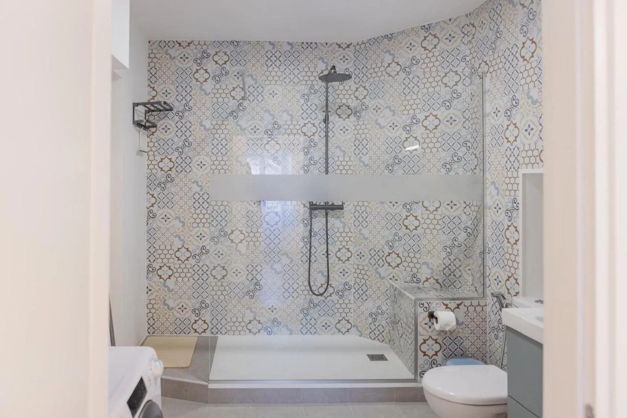 Full bathroom with spacious walk-in shower