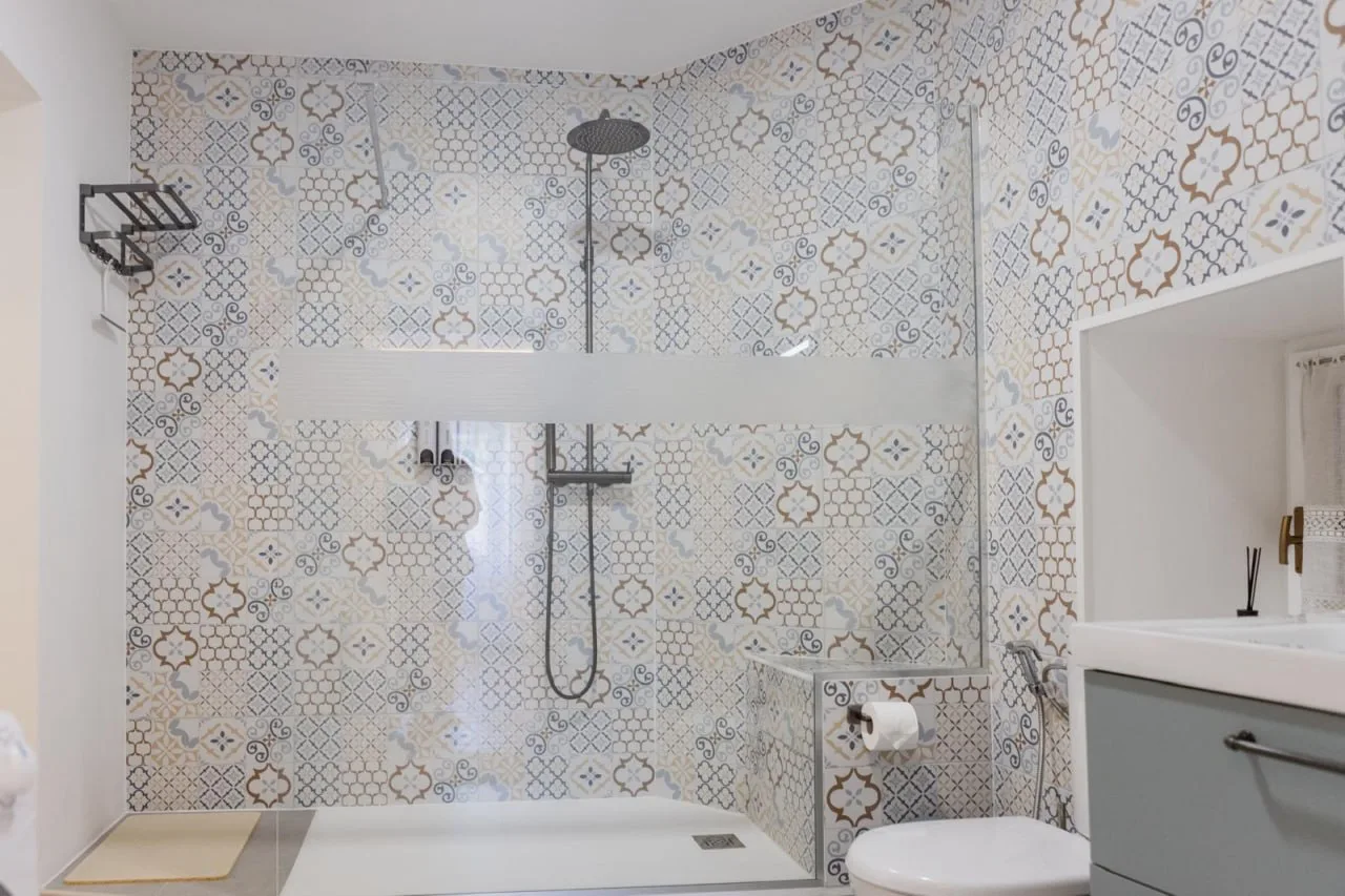 Walk-in shower and vanity in the bathroom