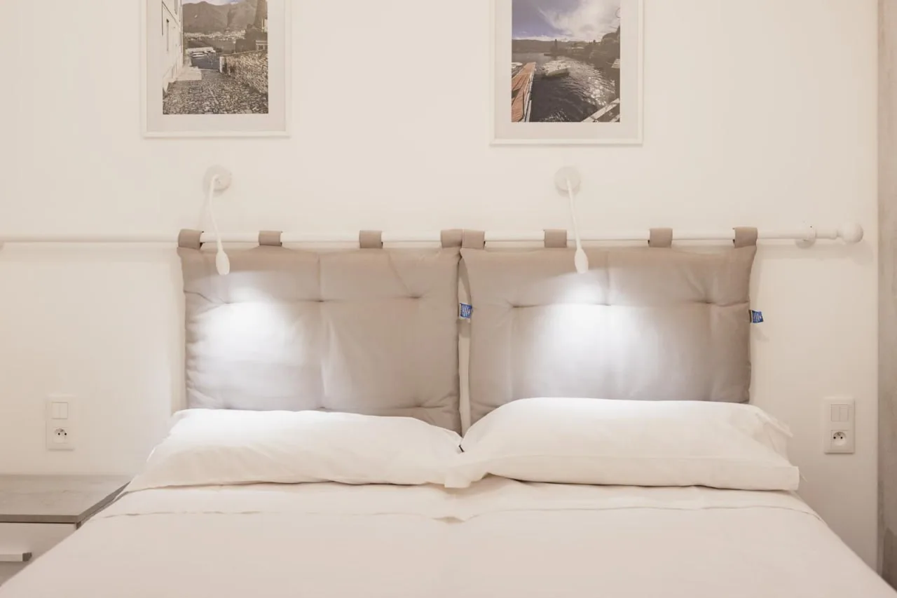 Reading lights and details in the second bedroom