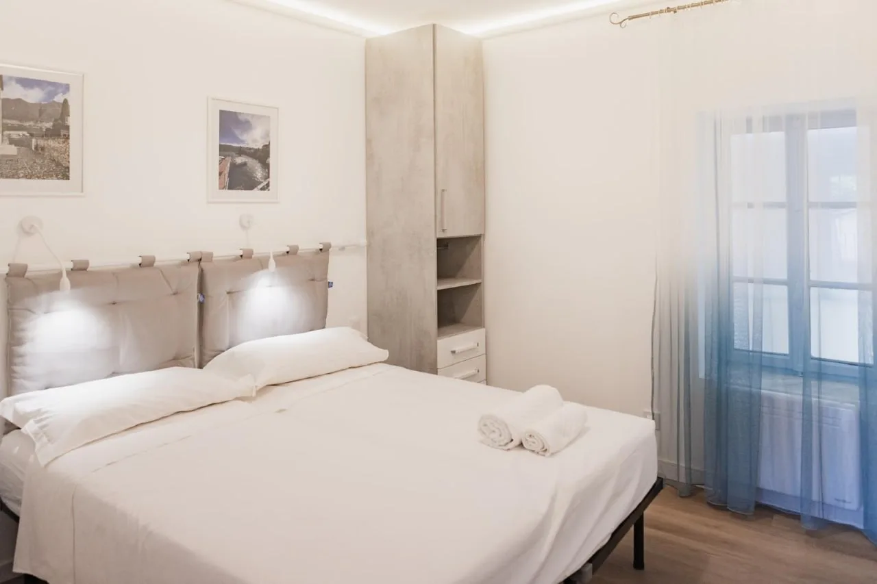 Second bedroom with wardrobe and window