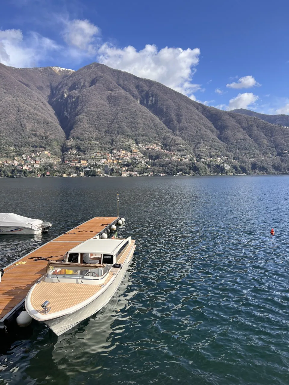 Boats at the pier in Laglio on Lake Como